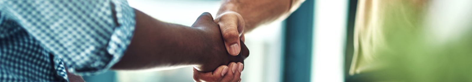 two men in a handshake